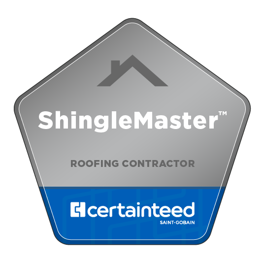 A hexagonal badge with a gray top and blue bottom. The top section has a house roof icon and the text "ShingleMaster™ Roofing Contractor." The bottom blue section features the CertainTeed Saint-Gobain logo.